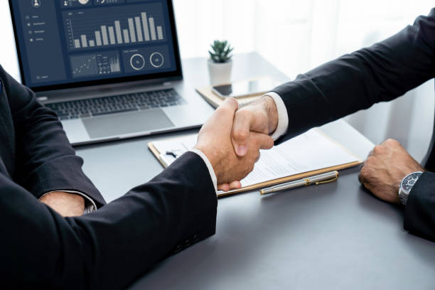 istock Successful job interview at business office with handshake. Fervent 1480345328