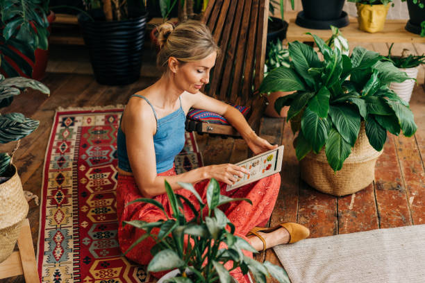 istock A woman on a tablet shops online and makes an order with delivery. 1480350559
