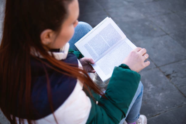 istock Having a great day at the park reading a book 1480352679