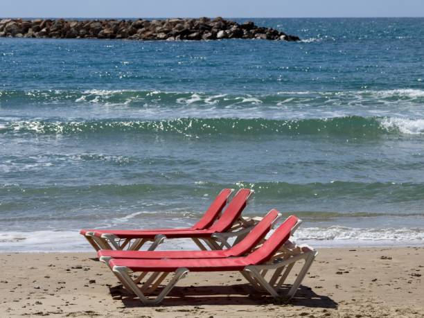 istock Chairs and lounges at the spectacular sandy beach 1480354642
