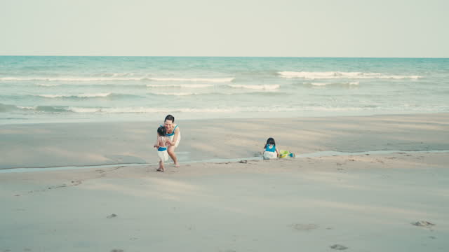 A child having fun on the beach.