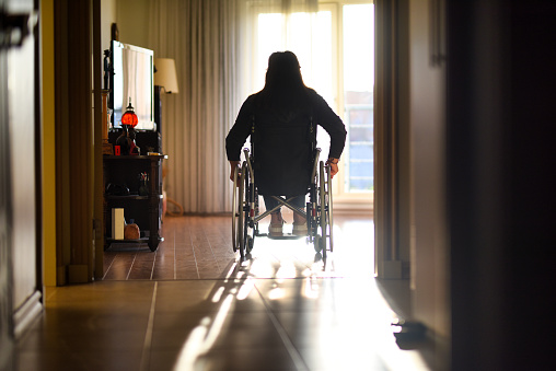 Wheelchair user on the move indoors