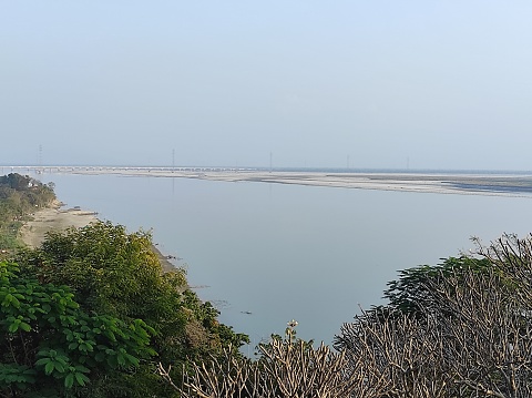 Landscape view of Brahmaputra river with Bhumuraguri bridge from Agnigarh hills Tezpur