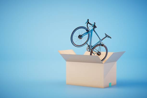 an open box from which the bike flies out on a blue background. copy paste, copy space. 3D render.