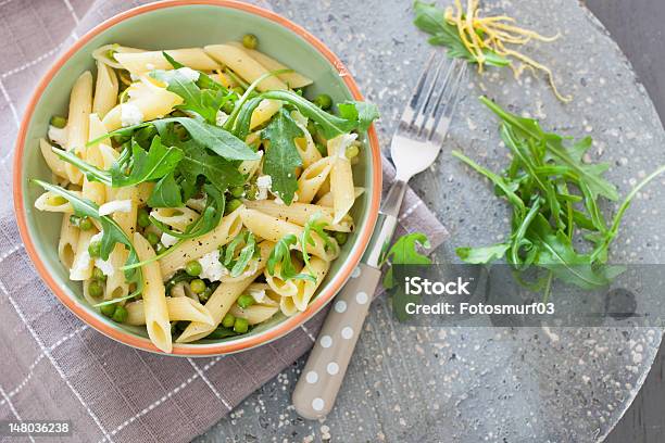 Pasta With Goatcheese And Rocket Stock Photo - Download Image Now - Arugula, Bowl, Cheese