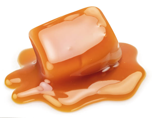 istock Caramel candy in milk caramel sauce isolated on white background. 1480376450