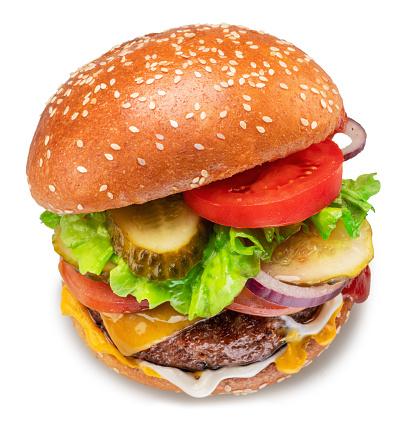 Cheeseburger Burger Hamburger with cheddar cheese and bacon, salad, onion, pickles and tomato isolated on white background