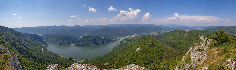 Panoramic view of Danube in Djerdap gorge from Serbian side on sunny day. View on Romania.