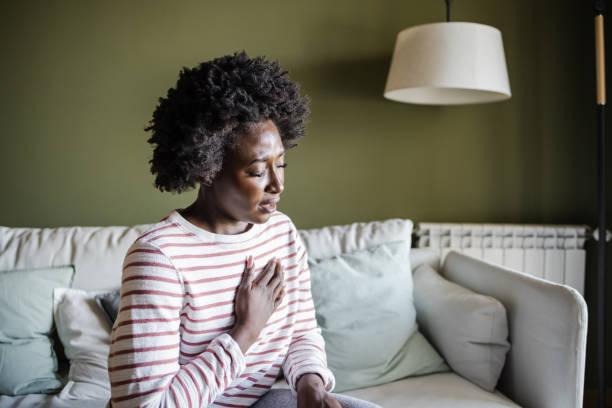 A young woman is having chest pains
