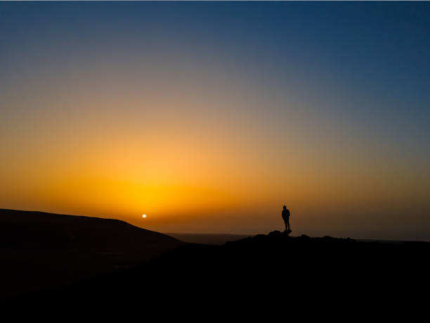 Photo of Watching a beautiful sunset from a high vantage point from a volcano near Corralejo in Fuerteventura
