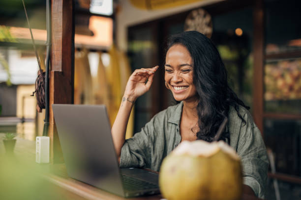 istock Beautiful woman using laptop 1480381138