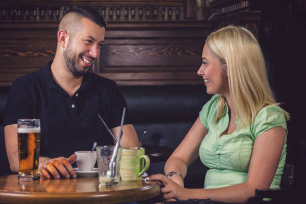 istock Young couple having a coffee date in a cafe 1480396863