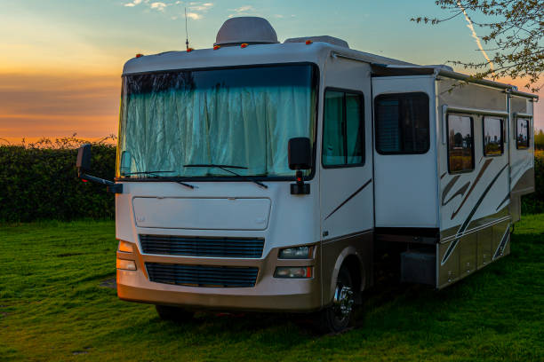 istock Camping early morning in Rv on grass 1480399408