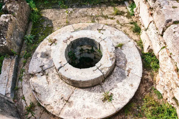 Photo of The archaeological site of Eleusis. Well of the fair dances where goddess Demeter rested, when she first came to Eleusis.