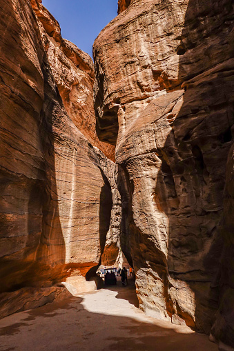 Petra, Jordan March 23, 2023 People walking on the main Siq trail