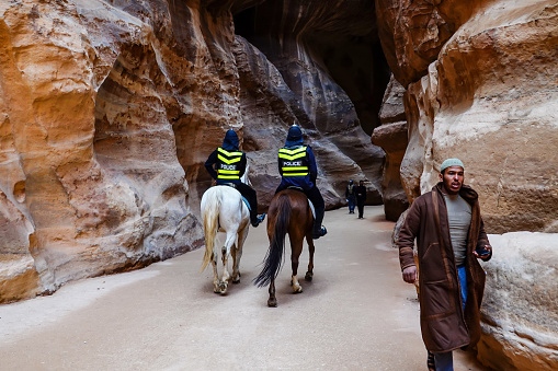 Petra, Jordan March 23, 2023 Police on horseback patrol the park.