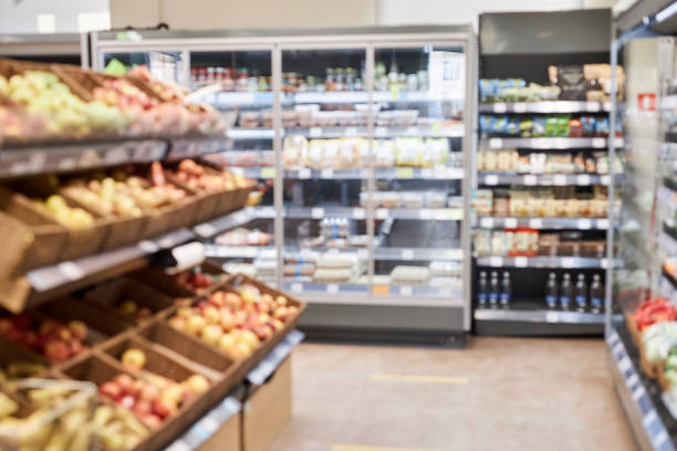istock Supermarket with shelves stacked with fruits and vegetables section 1480439903