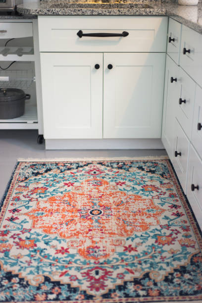 Kitchen Cabinet Area with Colorful Rug