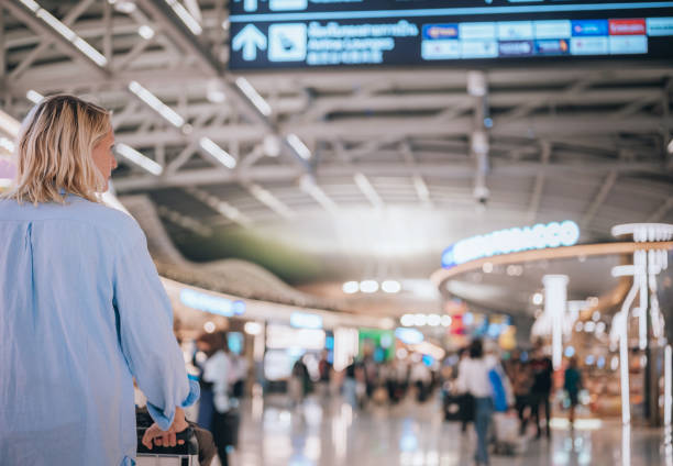 istock Traveler Heading to a Flight Gate 1480448430