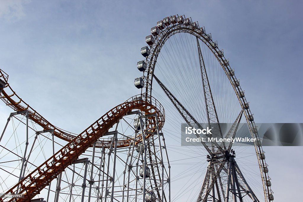 Roller Coaster and Ferris Wheel Roller coaster and ferris wheel. Amusement Park Stock Photo
