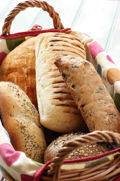 Bread rolls of various shapes and sizes stock photo