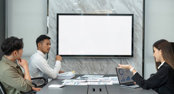 istock business people discuss and analyze work, statistics, plans, startup in a meeting room. Teamwork. Presentation 1480464939