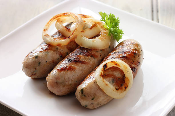 Griddled pork and sage sausages stock photo