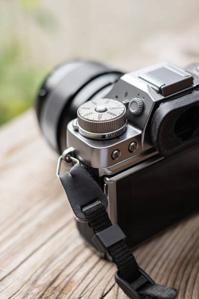 istock Digital camera mirrorless camera ready for take a photo. Modern MILC camera shooting outdoors photograpy 1480491768