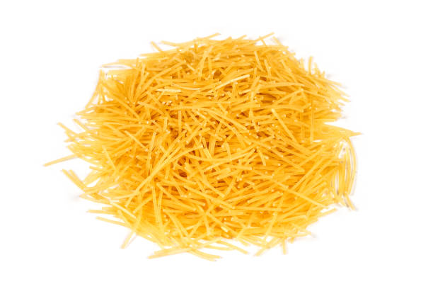 istock A bunch of small pasta on a white background. 1480493350