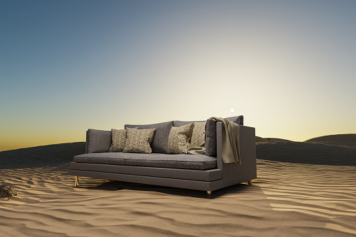 lonely living room couch in desert environment; immersion entertainment movie concept; 3D illustration