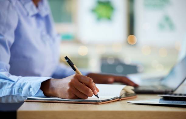 istock Hands, writing or notebook for financial data, company budget or insurance accounting in business office. Zoom, black woman or calculating finance worker and notes, tax schedule or fintech technology 1480495520