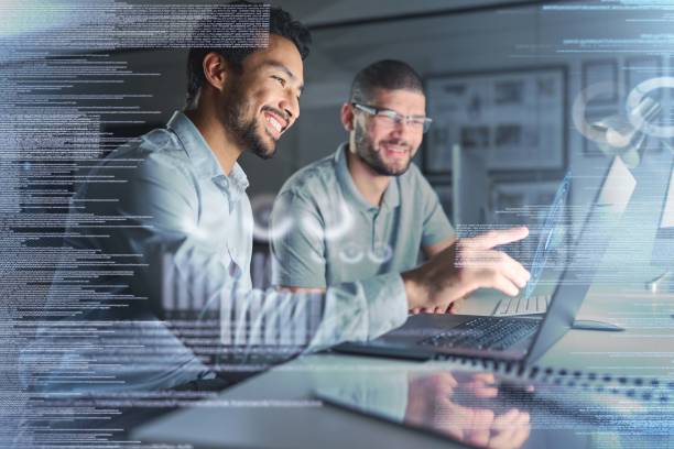 istock Teamwork, laptop hologram and people with data analytics, cyber security research and cloud computing. Coding, programming and developer business men with software strategy, planning in night overlay 1480501146