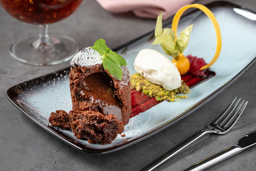 Chocolate souffle with ice cream served in a fine dining restaurant