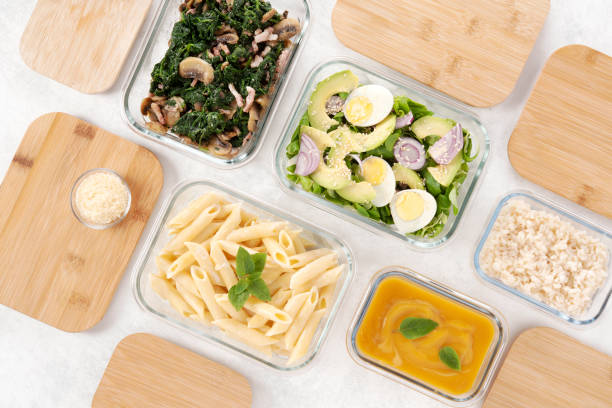 istock Batch cooking. Lunch box. Meals for the week. Glass containers, bamboo lid. 1480501931