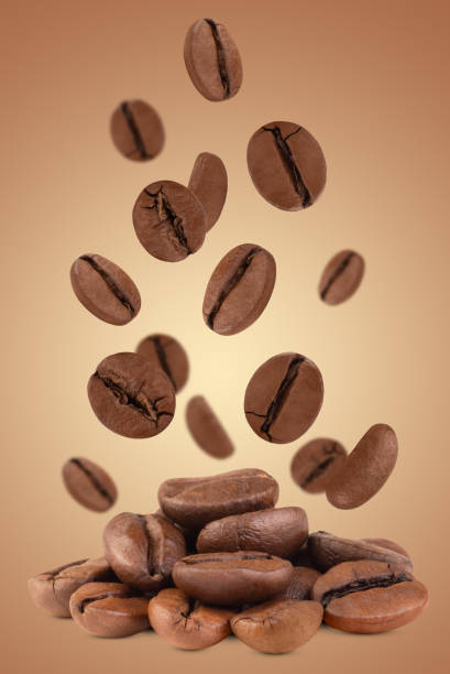istock Levitation of coffee beans on a brown background. 1480503917