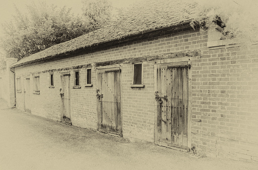 Line of old sheds vintage effect with wooden doors