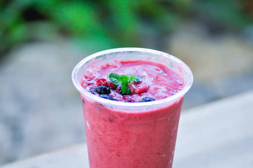 strawberry yogurt smoothie, mixed berry smoothieor berry smoothie with berry topping