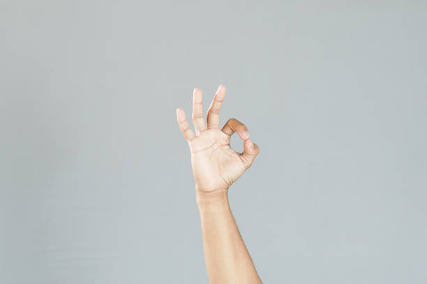 istock hand ok sign on grey background 1480512568