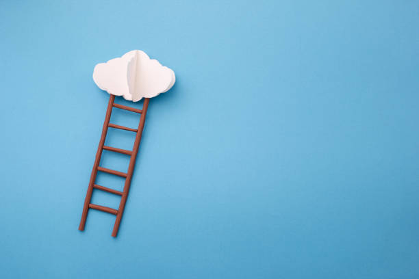 istock Stepladder into clouds made of paper cut on blue background. 1480512659