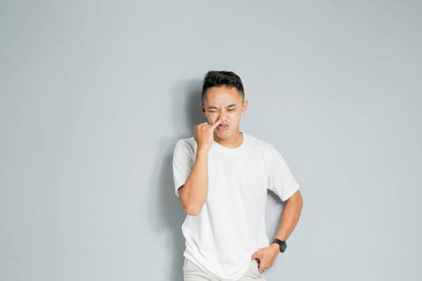 istock a young Asian is picking his nose 1480512683