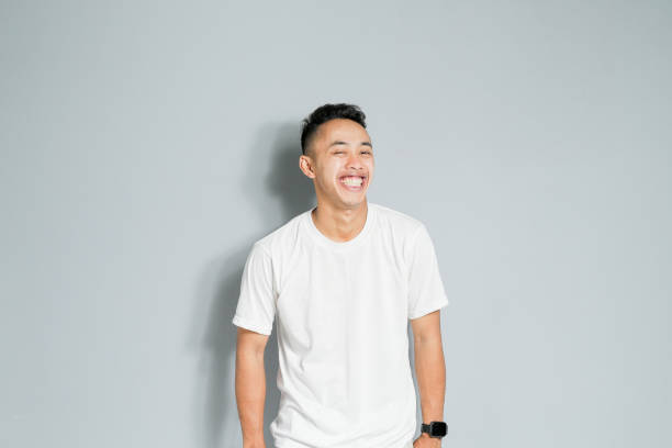 istock an asian youth showing a ridiculous expression 1480512781