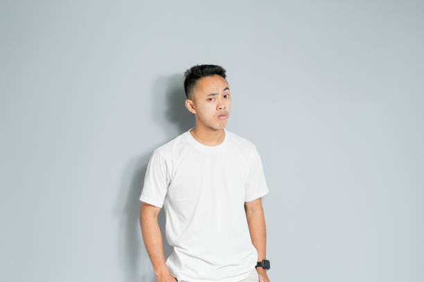 istock an asian youth showing a ridiculous expression 1480512809