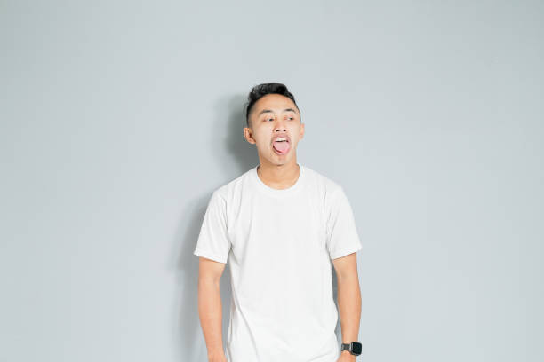 istock an asian youth showing a ridiculous expression 1480512824