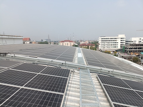 A roof of a building with solar panels on it