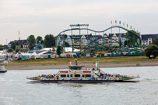 Dusseldorf/Germany - July 24 2015: Small boat in river as ferry