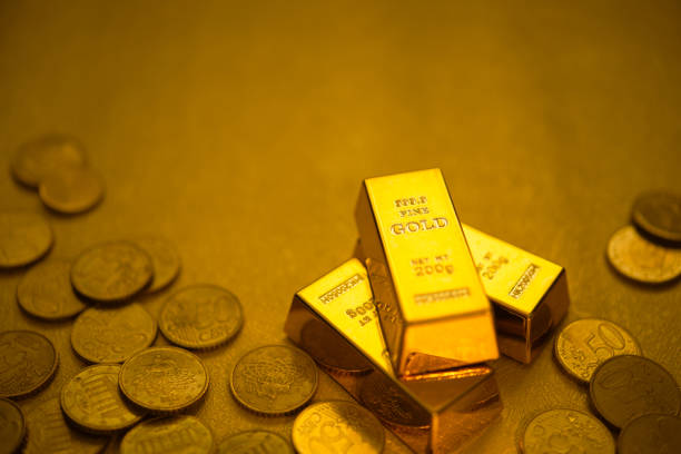 istock Gold bars and gold coins 1480520426