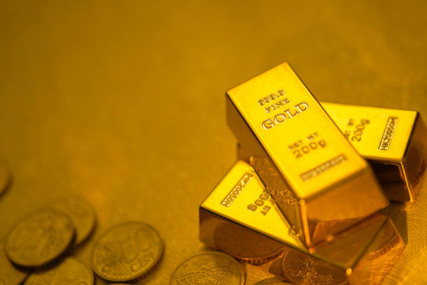istock Gold bars and gold coins 1480520429