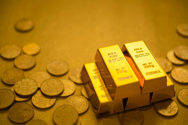 istock Gold bars and gold coins 1480520454