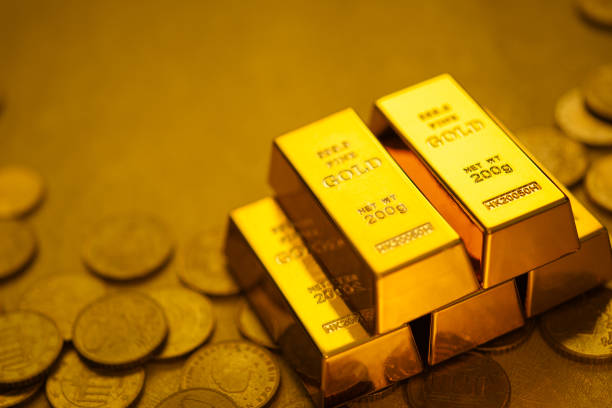 istock Gold bars and gold coins 1480520455