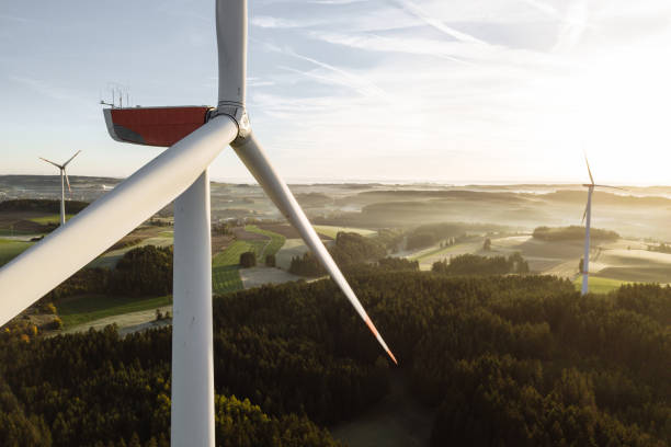 istock Wind turbines with low angle sunrise backlight seen from an aerial view 1480523588